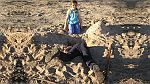 12-Sasha watches Jayden dig a big sandy hole at Red Gums campsite